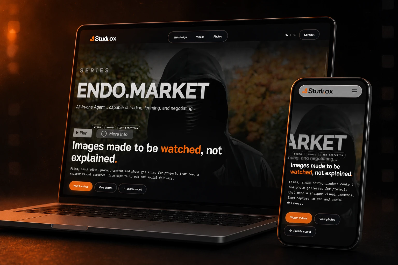 Studi0x showreel presented on a laptop and smartphone in an orange studio